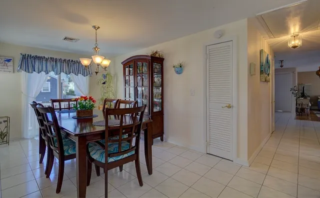 a view of a dining room with furniture