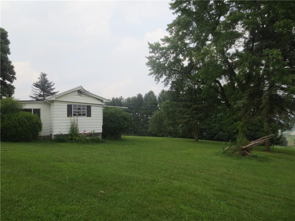 50 Hodell Road Armagh, PA 15920 - Photo 15 of 15 a front view of a house with garden
