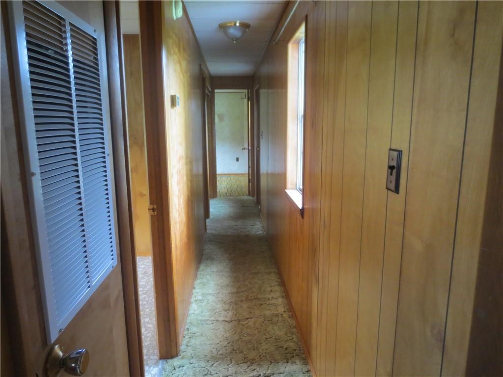 50 Hodell Road Armagh, PA 15920 - Photo 6 of 15 a view of a hallway with a wooden door