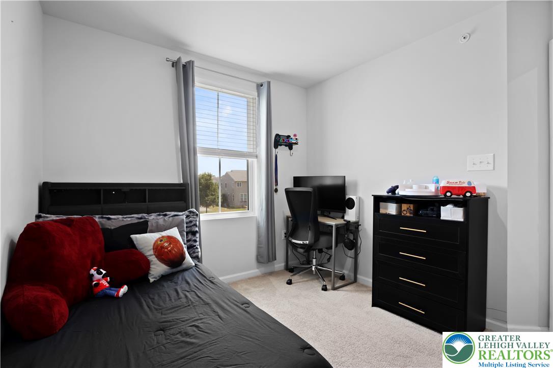 2336 Alex Road Easton, PA 18040 - Photo 17 of 35 A quiet bedroom offering comfort and a functional workstation.