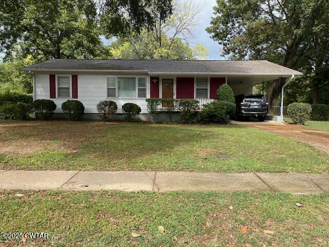 a front view of a house with garden and porch