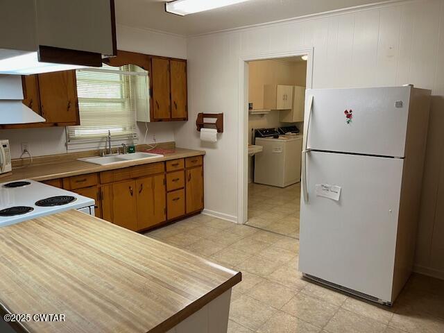 2000 Culpepper Street Milan, TN 38358 - Photo 4 of 13 a kitchen with a sink a stove and refrigerator