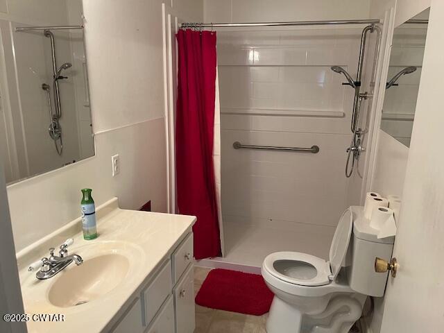 2000 Culpepper Street Milan, TN 38358 - Photo 6 of 13 a bathroom with a sink toilet and shower