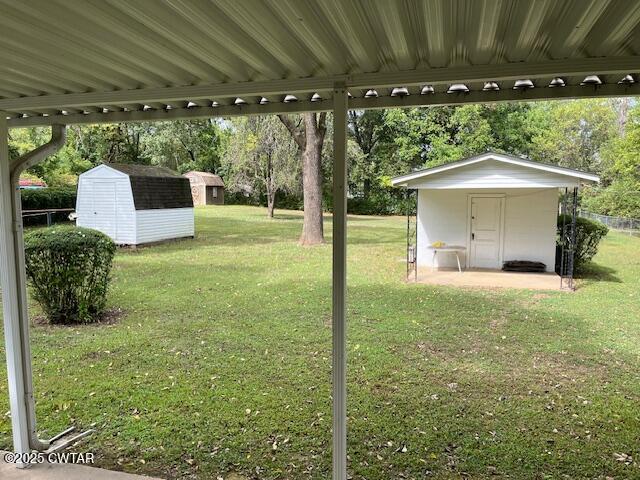 2000 Culpepper Street Milan, TN 38358 - Photo 9 of 13 a front view of a house with garden