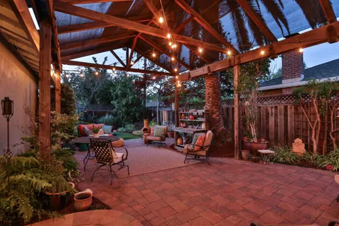 a view of outdoor space with lounge chairs
