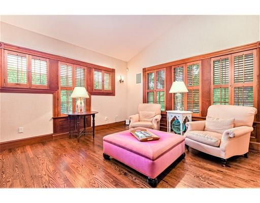 24 Stonefield Court Needham, MA 02492 - Photo 11 of 42 a living room with furniture and a large window