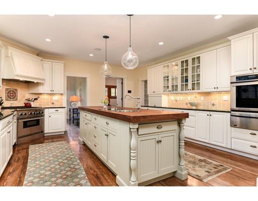 24 Stonefield Court Needham, MA 02492 - Photo 13 of 42 a kitchen with granite countertop a sink appliances cabinets and counter space