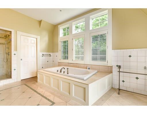 24 Stonefield Court Needham, MA 02492 - Photo 25 of 42 a spacious bathroom with bathtub sink and double vanity