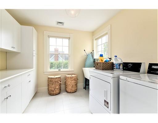 24 Stonefield Court Needham, MA 02492 - Photo 35 of 42 a view of washer and dryer with bathroom in the background