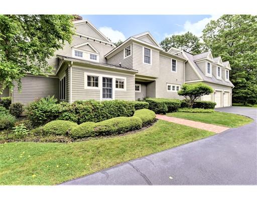 24 Stonefield Court Needham, MA 02492 - Photo 37 of 42 a front view of a house with a yard