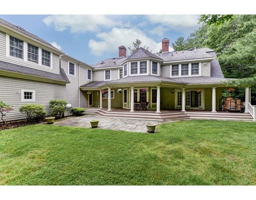 24 Stonefield Court Needham, MA 02492 - Photo 40 of 42 a house view with a garden space