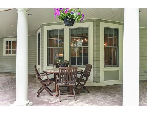 24 Stonefield Court Needham, MA 02492 - Photo 42 of 42 a view of a house with a porch and sitting area