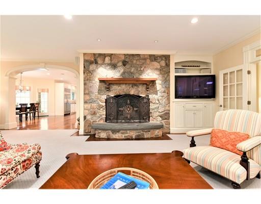 24 Stonefield Court Needham, MA 02492 - Photo 8 of 42 a living room with furniture and a fireplace