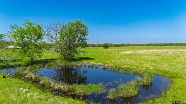 a view of a lake with outdoor space