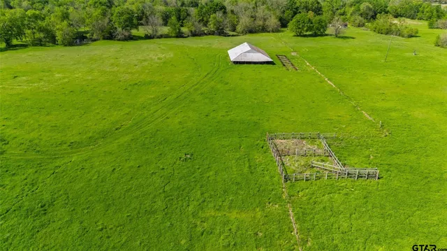a view of a golf course with a lake