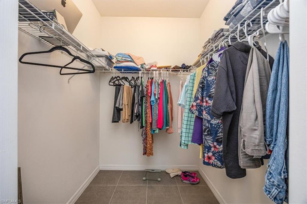5547 Useppa Drive Ave Maria, FL 34142 - Photo 14 of 33 Spacious closet with tile patterned floors
