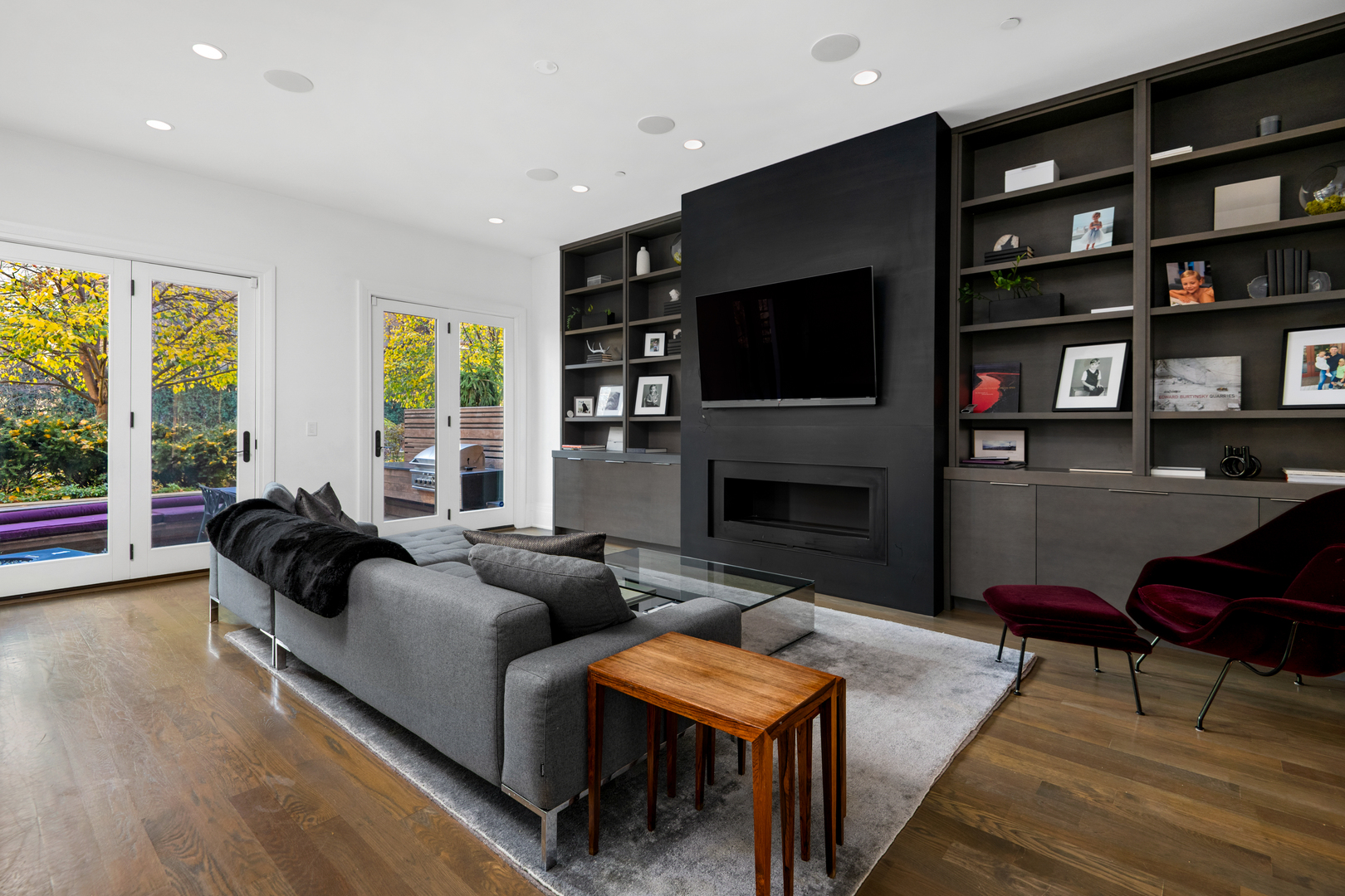453 West Deming Place Chicago, IL 60614 - Photo 11 of 50 a living room with furniture a fireplace and a flat screen tv