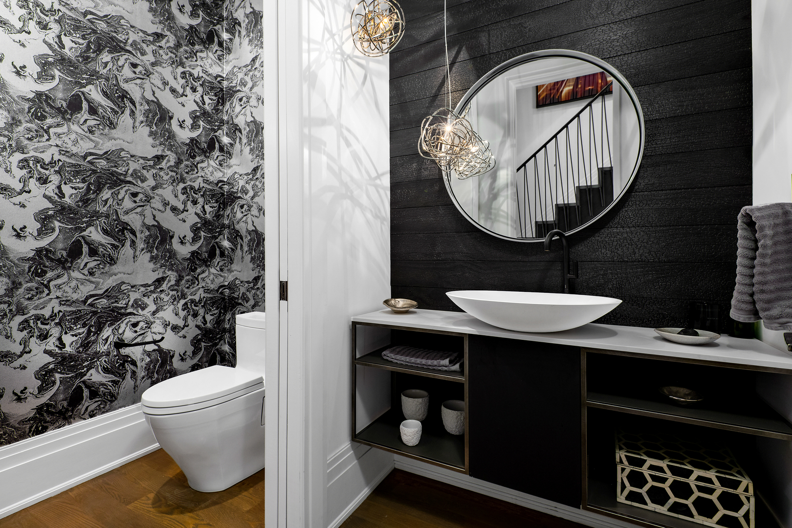 453 West Deming Place Chicago, IL 60614 - Photo 15 of 50 a bathroom with a sink a toilet and a mirror