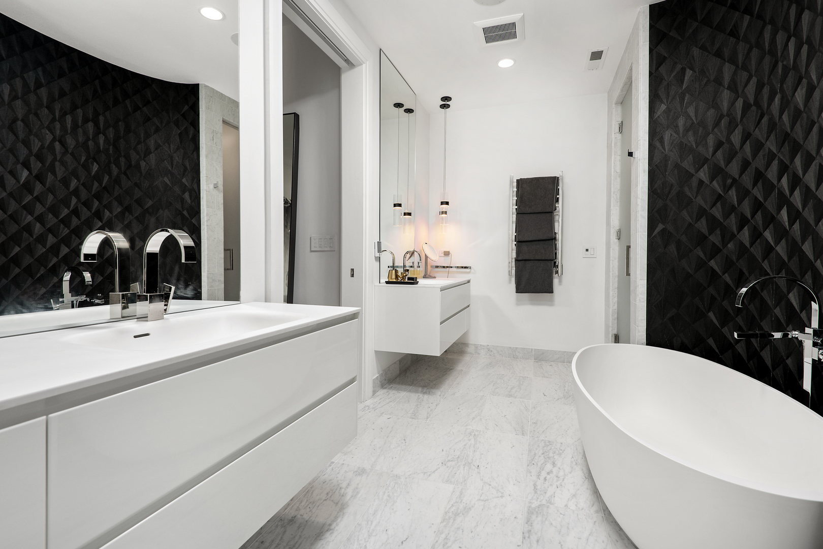 453 West Deming Place Chicago, IL 60614 - Photo 20 of 50 a bathroom with a double vanity sink toilet and shower