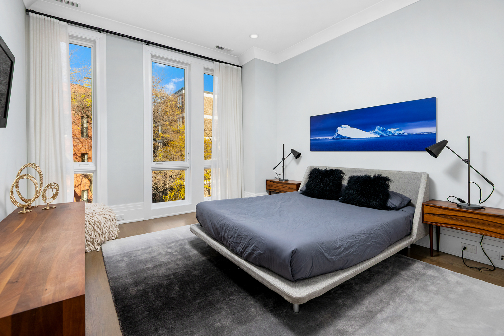 453 West Deming Place Chicago, IL 60614 - Photo 26 of 50 a bedroom with a bed and wooden floor