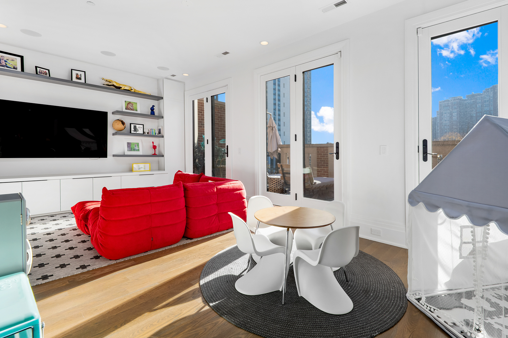 453 West Deming Place Chicago, IL 60614 - Photo 29 of 50 a living room with furniture and a flat screen tv