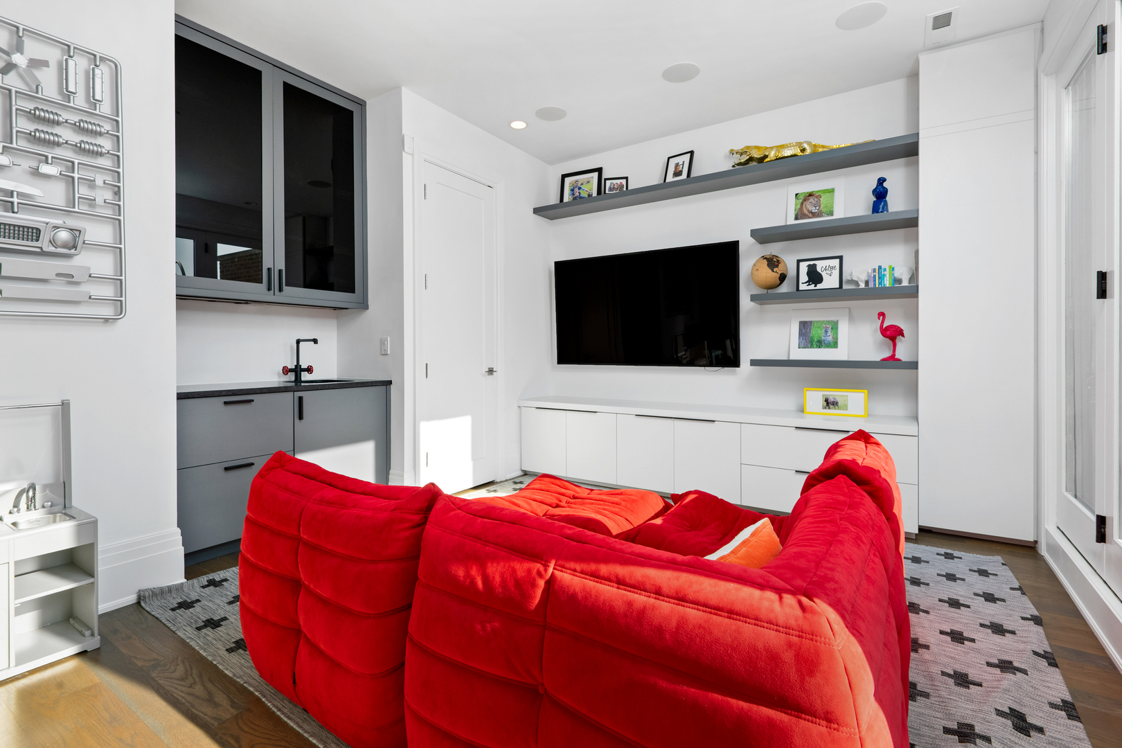 453 West Deming Place Chicago, IL 60614 - Photo 30 of 50 a living room with a bed and flat screen tv