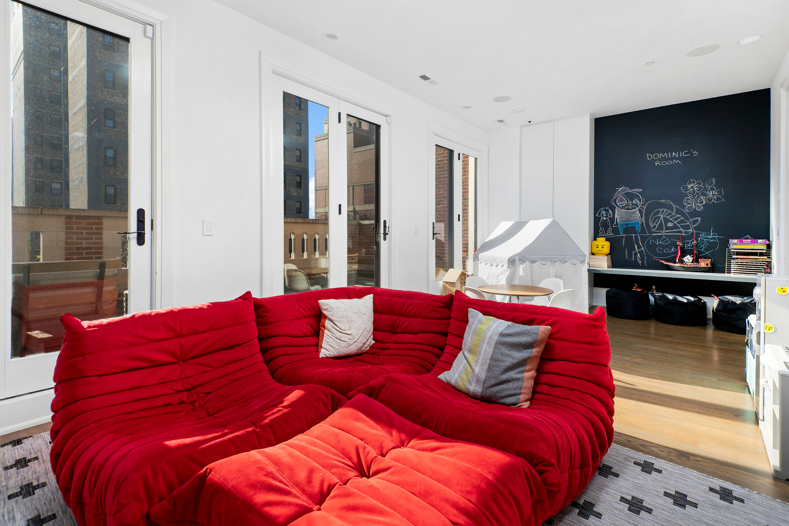 453 West Deming Place Chicago, IL 60614 - Photo 31 of 50 a living room with bed and a flat screen tv