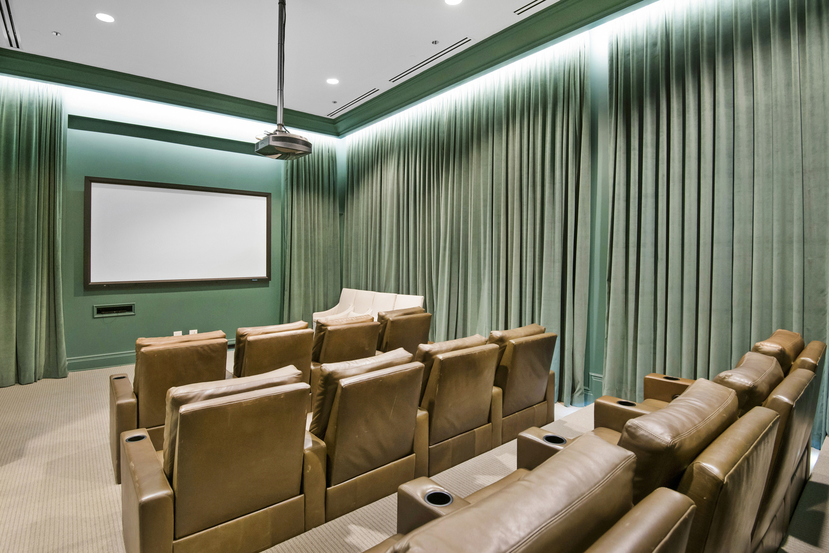 453 West Deming Place Chicago, IL 60614 - Photo 46 of 50 a media room with lots of chairs and a projector screen