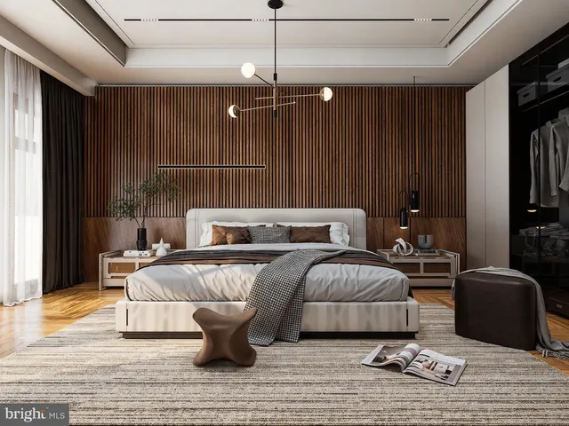 a living room with furniture a ceiling fan and a rug