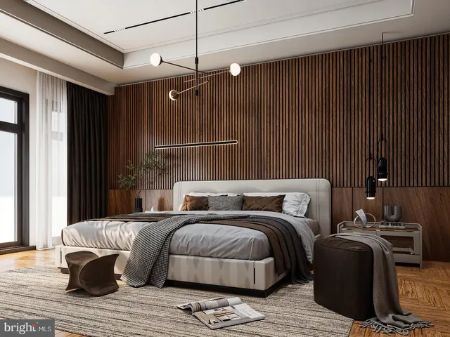 a bedroom with double bed and a window