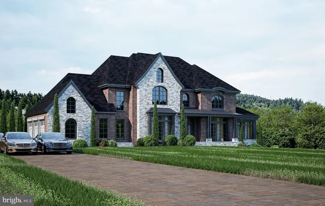 a front view of a house with a garden and plants