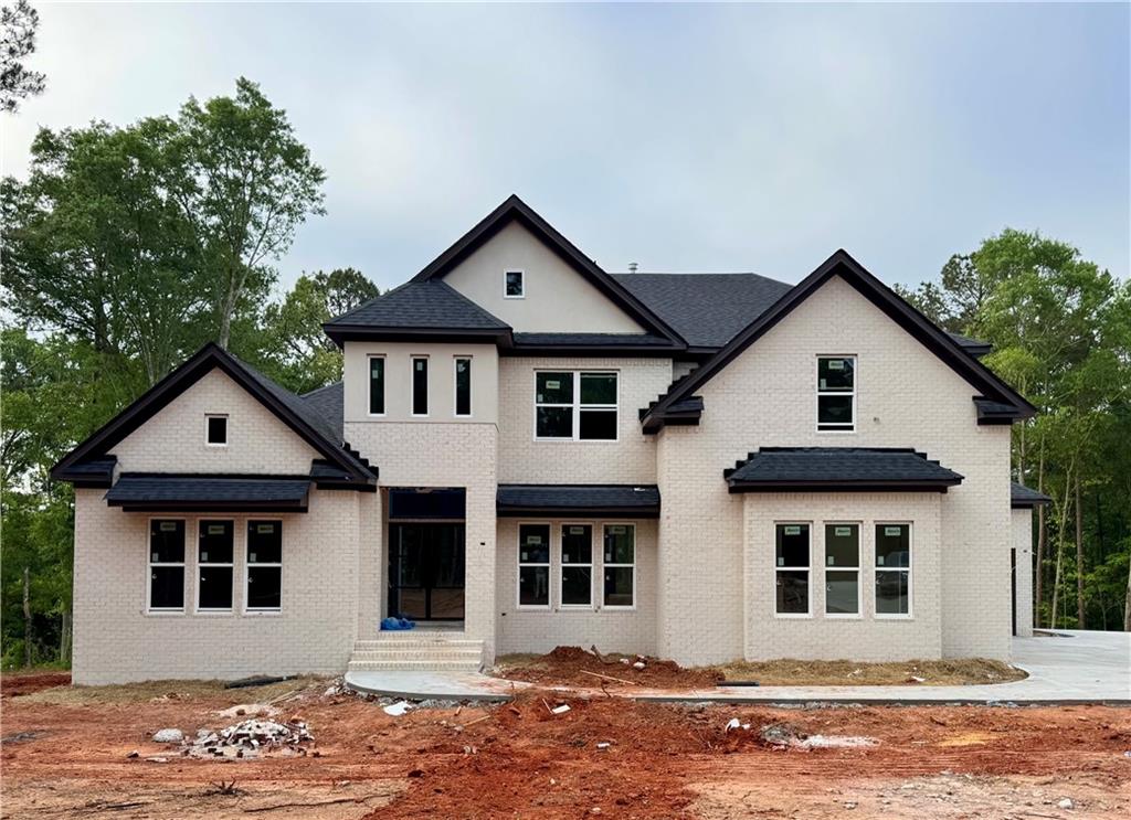 1290 New Hope Church Road Monroe, GA 30656 - Photo 1 of 3 a front view of a house with a yard