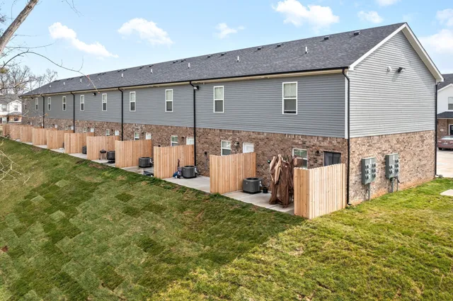 a view of a back yard of the house
