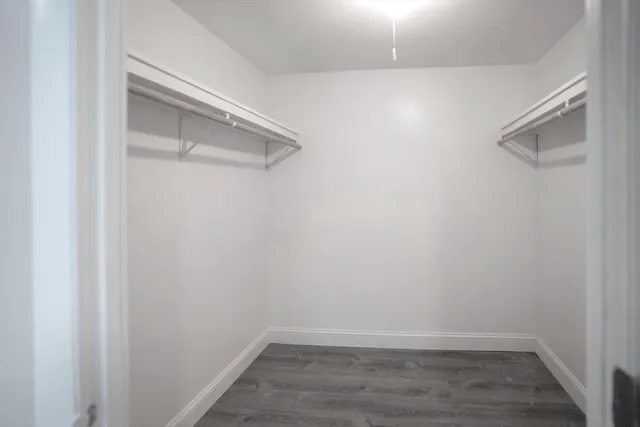 a bathroom with a sink toilet vanity and bathtub