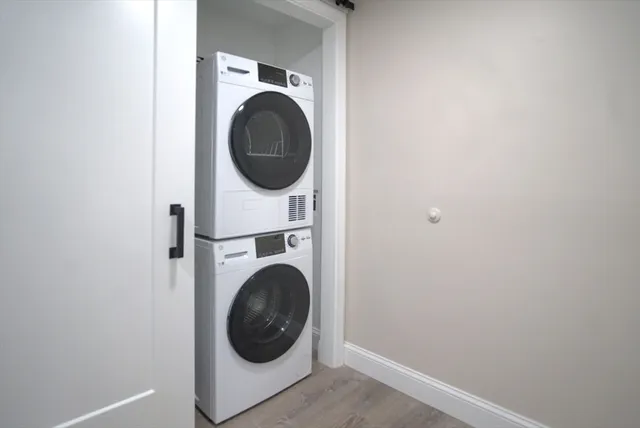 a kitchen with a refrigerator and a stove