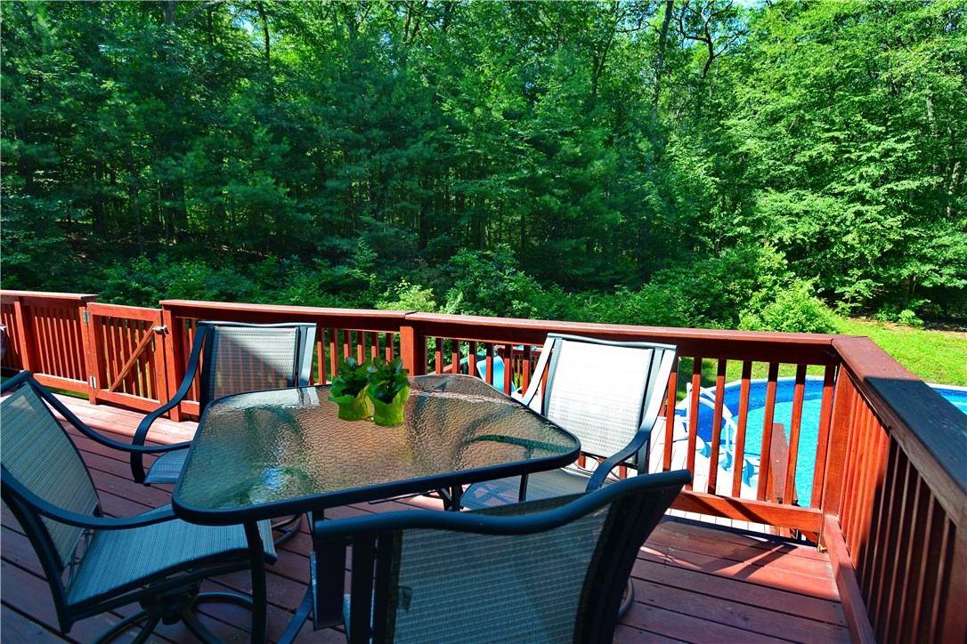 66 Old Quarry Road Glocester, RI 02857 - Photo 33 of 40 Very private large deck overlooking above ground pool.