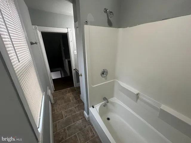 a bathroom with a bathtub