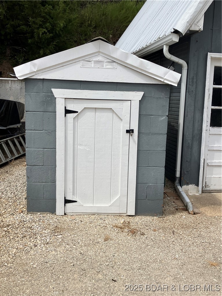 122 Excelsior Lane Gravois Mills, MO 65037 - Photo 32 of 59 private well house