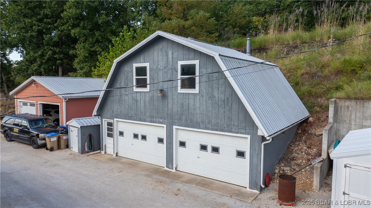 122 Excelsior Lane Gravois Mills, MO 65037 - Photo 5 of 59 Oversized 2 car garage with huge loft area above