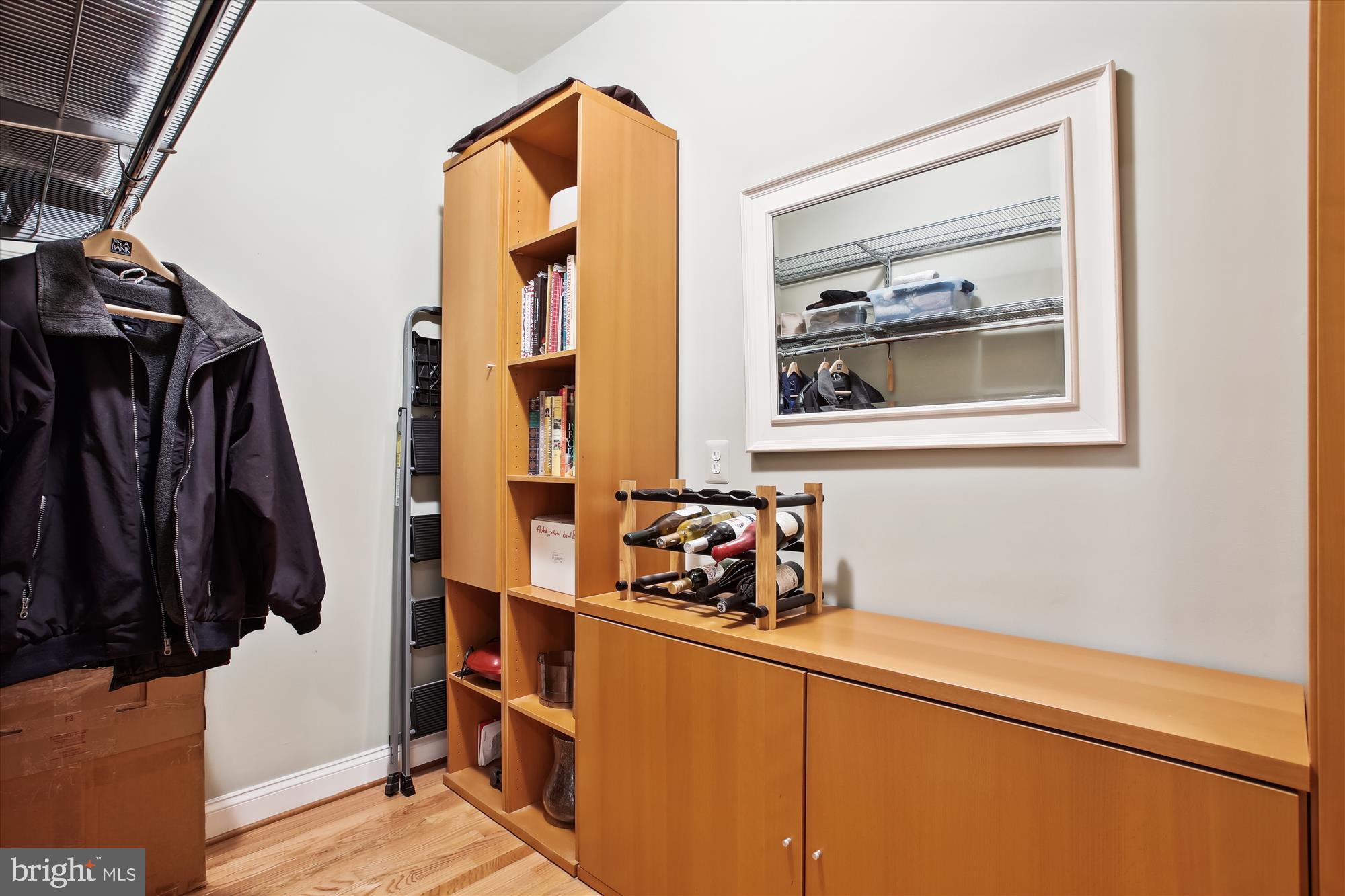 22902 North Brown Square Ashburn, VA 20148 - Photo 13 of 70 a view of walk in closet with clothes and shoes