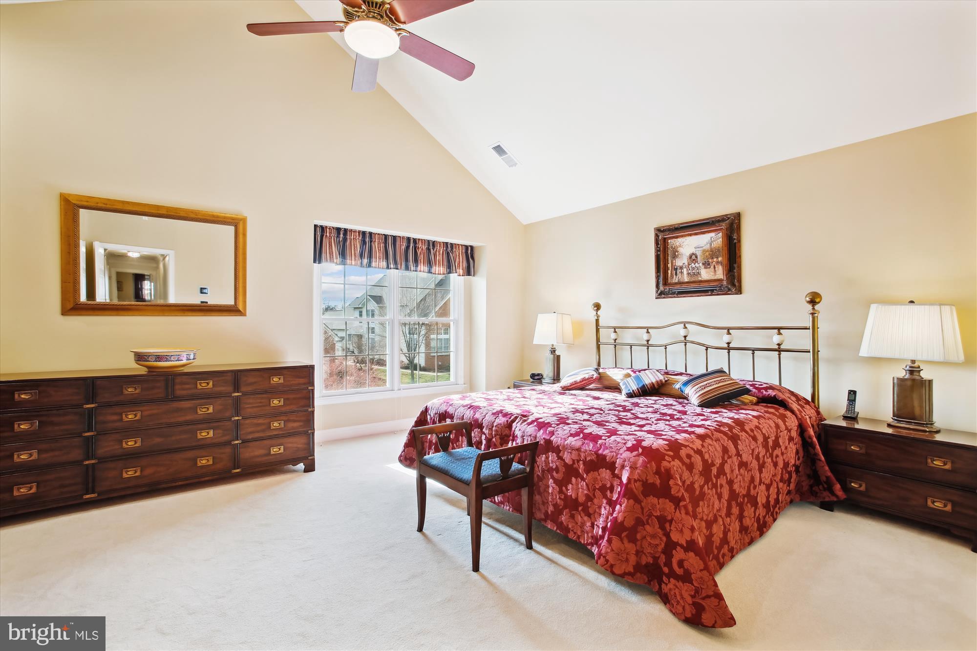 22902 North Brown Square Ashburn, VA 20148 - Photo 24 of 70 a bedroom with a bed dresser and wooden floor