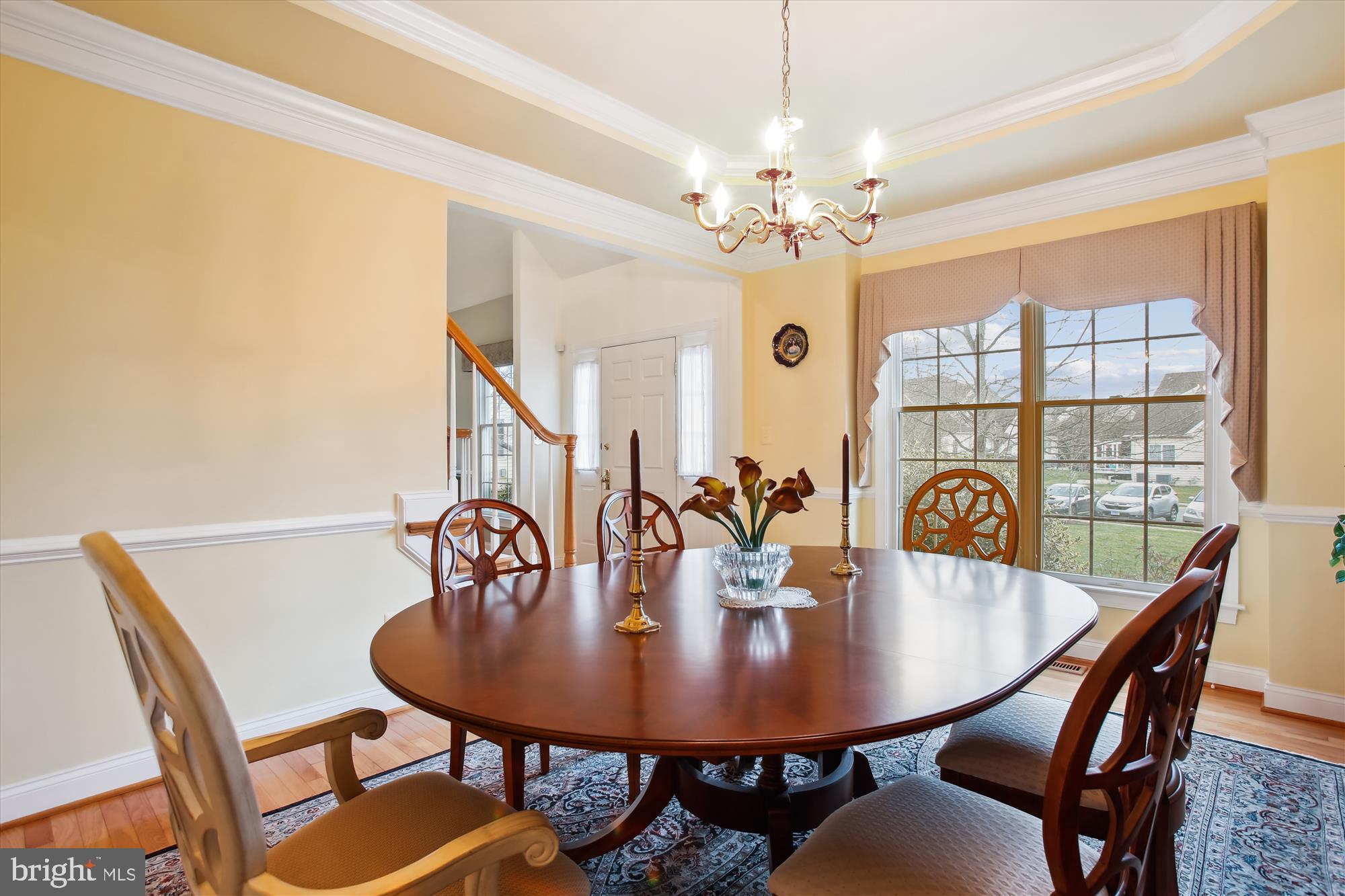 22902 North Brown Square Ashburn, VA 20148 - Photo 5 of 70 a view of a dining room with furniture and chandelier