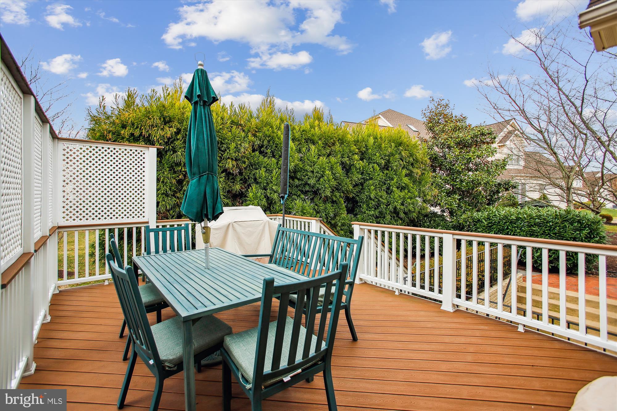 22902 North Brown Square Ashburn, VA 20148 - Photo 52 of 70 a view of a wooden chairs on the roof deck
