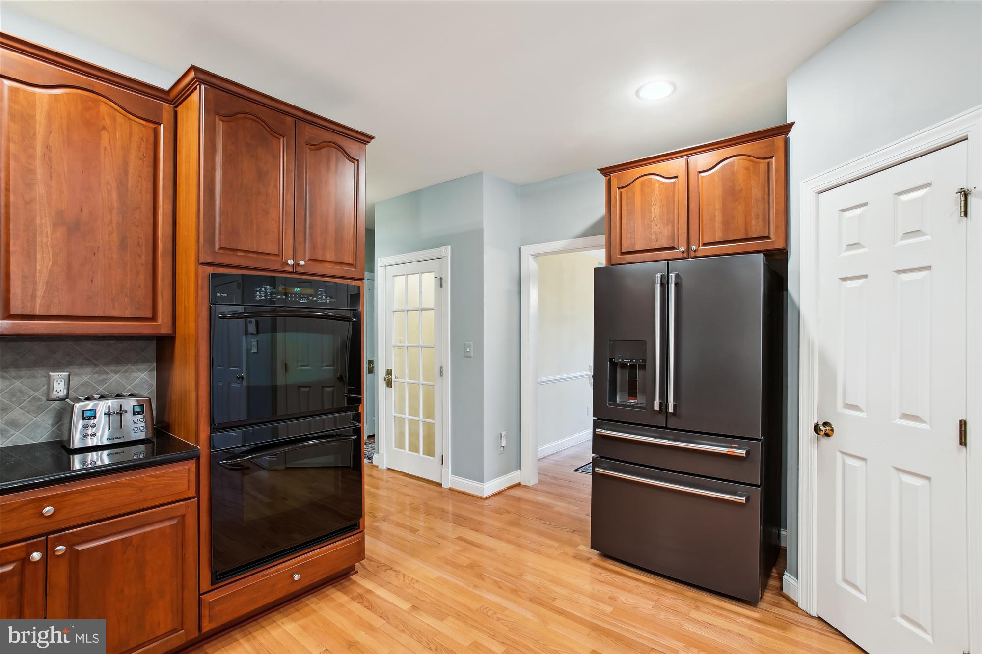 22902 North Brown Square Ashburn, VA 20148 - Photo 10 of 70 a kitchen with stainless steel appliances granite countertop a refrigerator and microwave