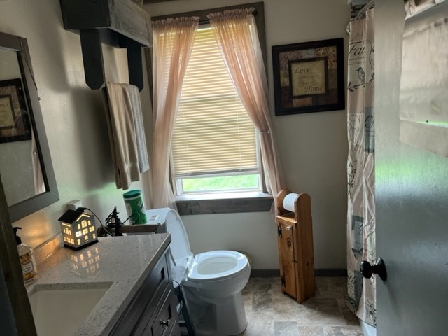 279 Rainbow Road Polk, PA 16342 - Photo 8 of 13 a bathroom with a granite countertop sink toilet and shower