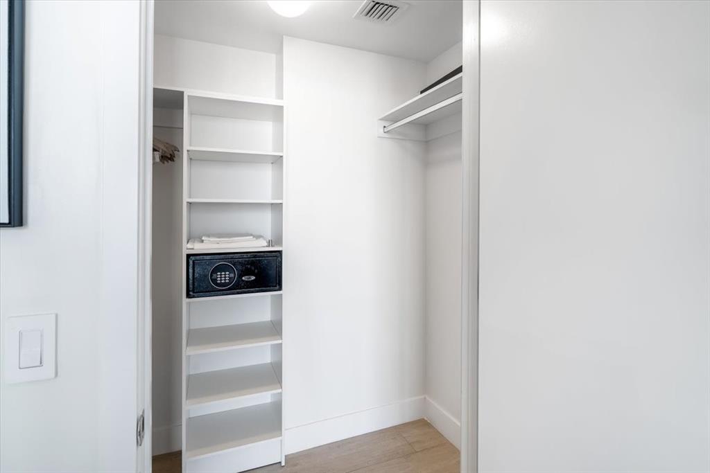 4010 South Ocean Drive, Unit R1102 Hollywood, FL 33019 - Photo 26 of 47 a view of a walk in closet with empty racks