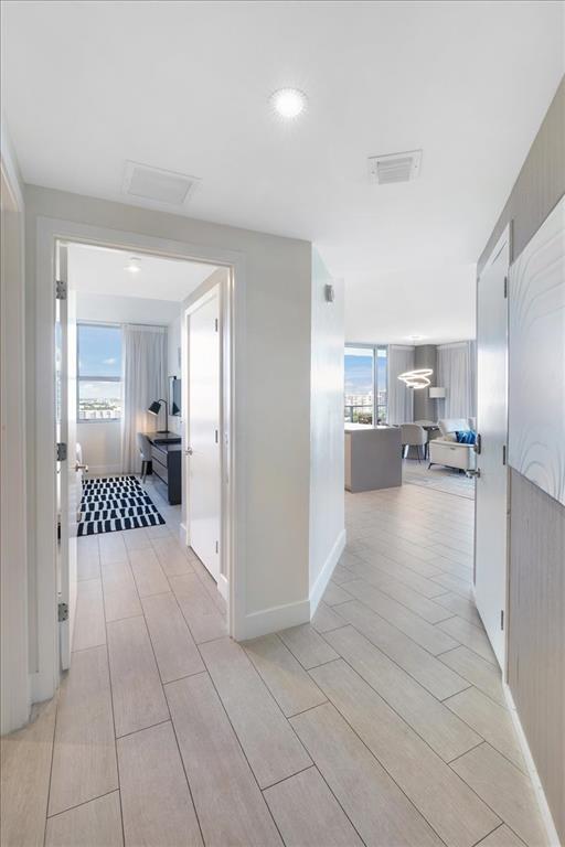 4010 South Ocean Drive, Unit R1102 Hollywood, FL 33019 - Photo 27 of 47 a view of a living room kitchen and a livingroom