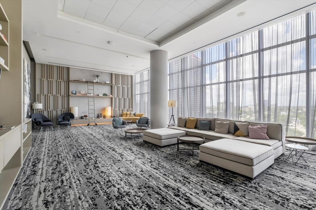 4010 South Ocean Drive, Unit R1102 Hollywood, FL 33019 - Photo 38 of 47 a living room with furniture and large windows