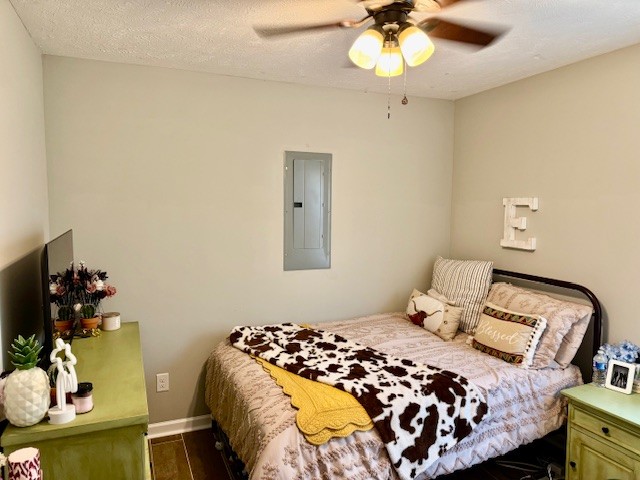1316 Old Cowan Road Winchester, TN 37398 - Photo 14 of 23 a bedroom with a bed and a chandelier