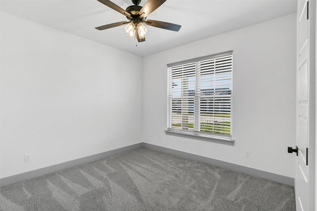 2029 Rattler Way Tolar, TX 76476 - Photo 27 of 28 a view of an empty room with a window